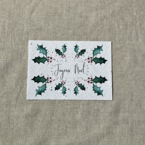 Carte de voeux illustrée a l'aquarelle de feuilles de houx avec le texte joyeux Noël